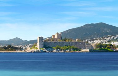 Long exposure photo of Bodrum castle on sunny day. Tourism and leisure concept.