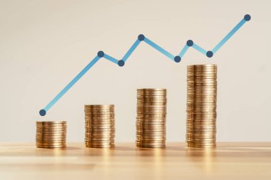 Close up Photo of constantly increasing coins on isolated background. Concept of rising money and climbing investment of new startup.