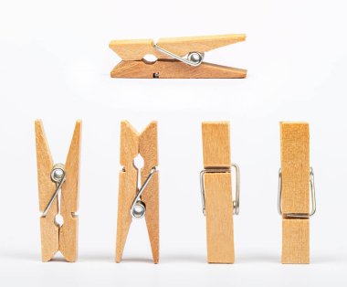 stack of clothespins on isolated white background.