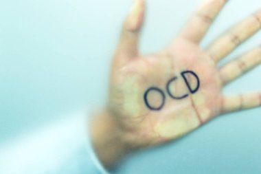 Close up photo of an ocd patient while washing hands for long periot of time. Concept of hygiene and ocd.