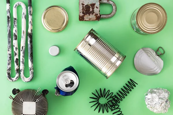 Metal Waste Materials Laid Green Isolated Background Waste Management Concept — Fotografia de Stock