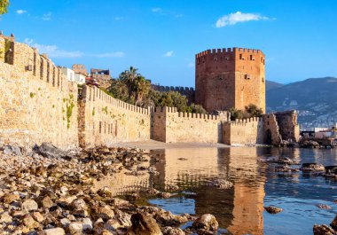 Close up photo of Red Tower which locally known as Kzl Kule in Alanya, Antalya, Turkey.