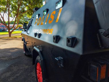 Rows of police tactical cars parked in the courtyard of the Gorontalo Regional Police Office.  it is used when guarding and dispersing anarchist demonstrations.  taken from the whole side or part of the car on August 9, 2022