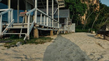 The wooden stilt houses are neatly lined up in the tourist area of Biluhu Beach, East of Gorontalo City.  it is rented out to visitors who wish to stay overnight.  outdoor photo on august 13, 2022