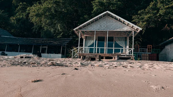 The wooden stilt houses are neatly lined up in the tourist area of Biluhu Beach, East of Gorontalo City.  it is rented out to visitors who wish to stay overnight.  outdoor photo on august 13, 2022