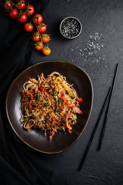 Japanese udon, soba with beef on black bowl