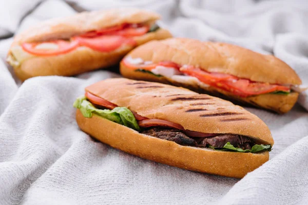 Three Fresh Sub Sandwiches Cloth Background — Foto de Stock