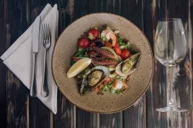 Seafood salad. Traditional spanish dish on wood