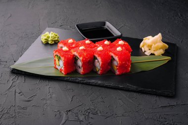 Sushi, rolls, California uramaki with tobiko caviar