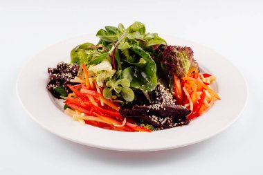 Slice fresh vegetables on the white plate
