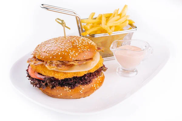 Crispy fried chicken burger served with french fries