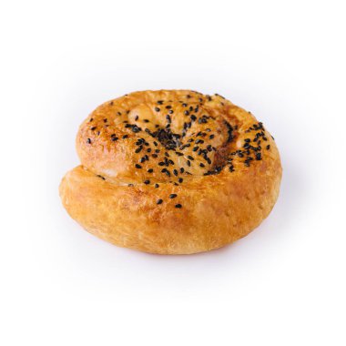 Susam tohumlu taze burulmuş çörek.
