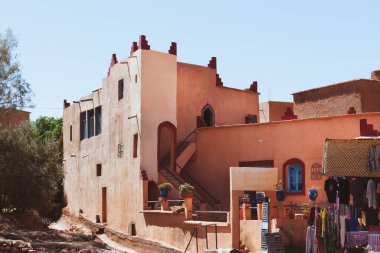 marrakech old orange building in morocco with strong lights and shadows