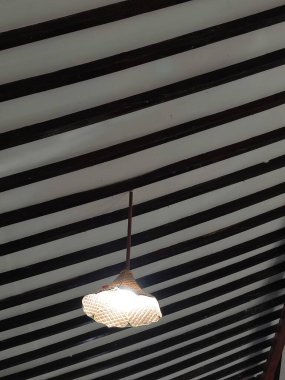 Lamp case made of traditional Javanese woven bamboo