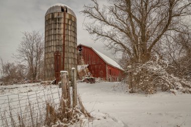 Abandoned barn on a snowy winter morning