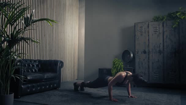 Atlético bela mulher faz push-ups.Sportswoman exercício em casa.Muscular jovem mulher fazendo flexões no tapete de exercício. — Vídeo de Stock