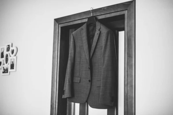 Stylish groom suit in dressing room indoors.