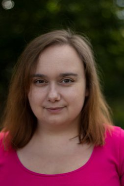 portrait of a beautiful young plus size woman