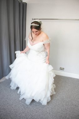 plus size beautiful woman wearing a wedding dress