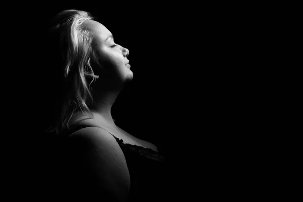 close up portrait Black and white image of a beautiful plus size woman