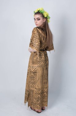 beautiful elegant female wearing African inspired clothing