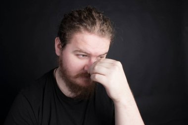 Plus size male with long hair and a beard