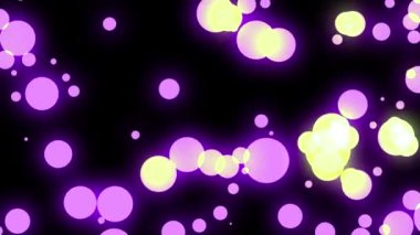 Animation of Pink Yellow Circles Bubbles With Purple Glow Bokeh Effect on A Black Background.
