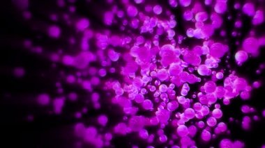 Abstract Glowing Large Pink Purple Round Ball Particles Animation on A Black Background