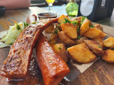 Lunch roasted potatoes and sausages 