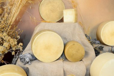 Cheeses with brown burlap cloth background