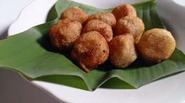 Indonesian traditional snacks made from grated cassava and then the inside is given brown sugar and then fried, this snack is called jemblem