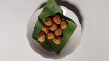 Indonesian traditional snacks made from grated cassava and then the inside is given brown sugar and then fried, this snack is called jemblem