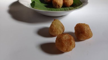 Indonesian traditional snacks made from grated cassava and then the inside is given brown sugar and then fried, this snack is called jemblem