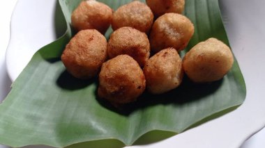 Indonesian traditional snacks made from grated cassava and then the inside is given brown sugar and then fried, this snack is called jemblem