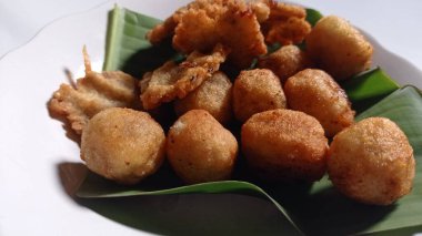Indonesian traditional snacks made from grated cassava and then the inside is given brown sugar and then fried, this snack is called jemblem