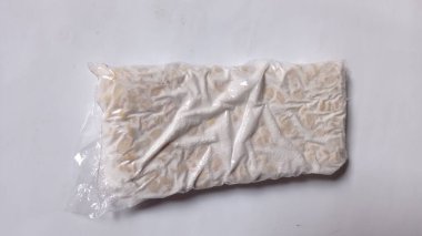 Raw tempeh is made from fermented soybeans, it can be stir-fried and mixed with other dishes