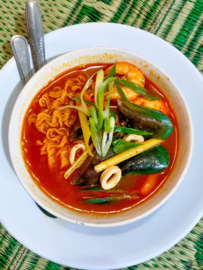 Rice Bowl mix seafood with sauce Padang from Indonesia 