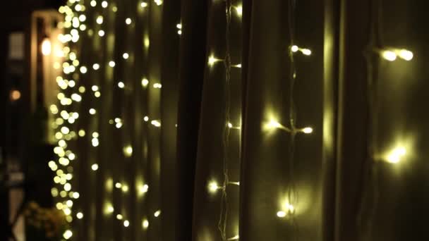 Festive Background Yellow Light Bulbs Defocused Bokeh — Stock Video