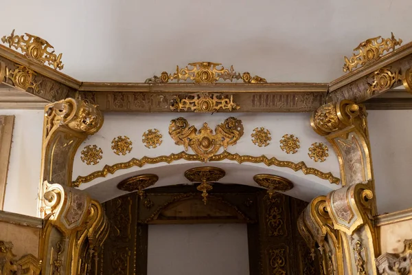 stock image a old gothic gold frame wall decor in old architecture