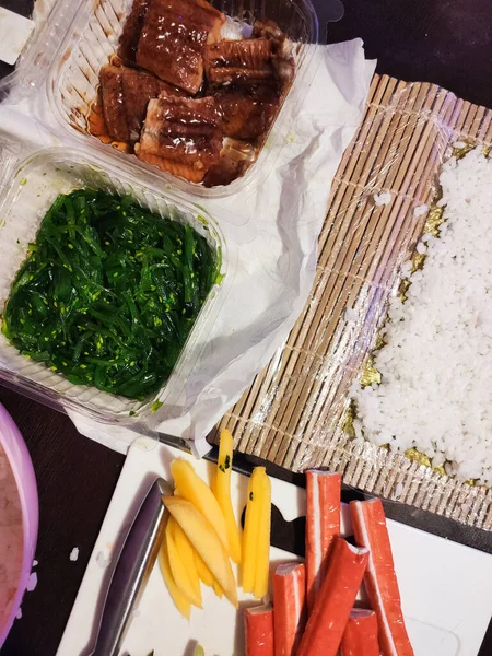 Ingredients Making Sushi Rolls Table Crab Stick Mango Rice Nori — ストック写真
