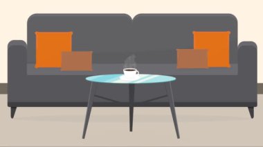 Kanepenin yanındaki masada buharlı kahve standı.