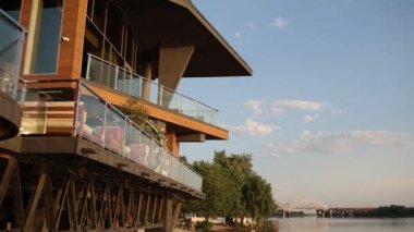  restaurant terrace near the river in summer on a sunny day