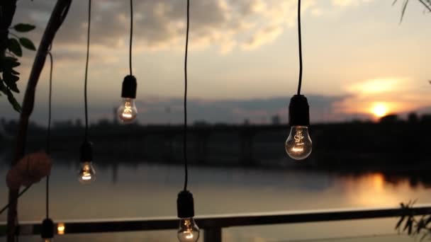 Light Bulbs Glow Restaurant Evening Pier Terrace — Stockvideo