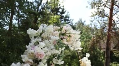 round wedding arch of flowers for the ceremony in the park close-up decor