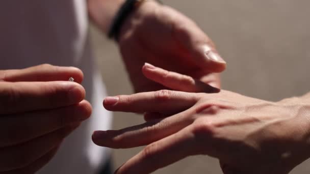 Man Put Wedding Golden Ring Finger Woman Hand — Vídeo de Stock