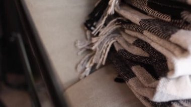 blankets on the sofa in the restaurant cafe bar evening