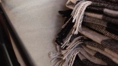 blankets on the sofa in the restaurant cafe bar evening