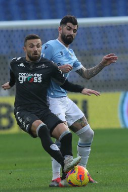 ROME, Italy - 06.01.2022:  F.DI FRANCESCO (EMP), ELSEID HYSAJ (LAZIO) in action during the Italian Serie A football match between SS LAZIO VS EMPOLI at Olympic stadium in Rome