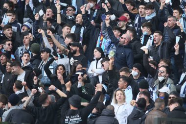 ROME, Italy - 06.01.2022:  LAZIO FANS PLAY WITH FFP2 MASK ON THE STANDS  during the Italian Serie A football match between SS LAZIO VS EMPOLI at Olympic stadium in Rome