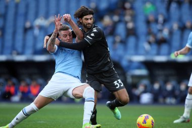 ROME, Italy - 06.01.2022: MILINKOVIC SAVIC (LAZIO), S.LUPERTO (EMP) in action during the Italian Serie A football match between SS LAZIO VS EMPOLI at Olympic stadium in Rome